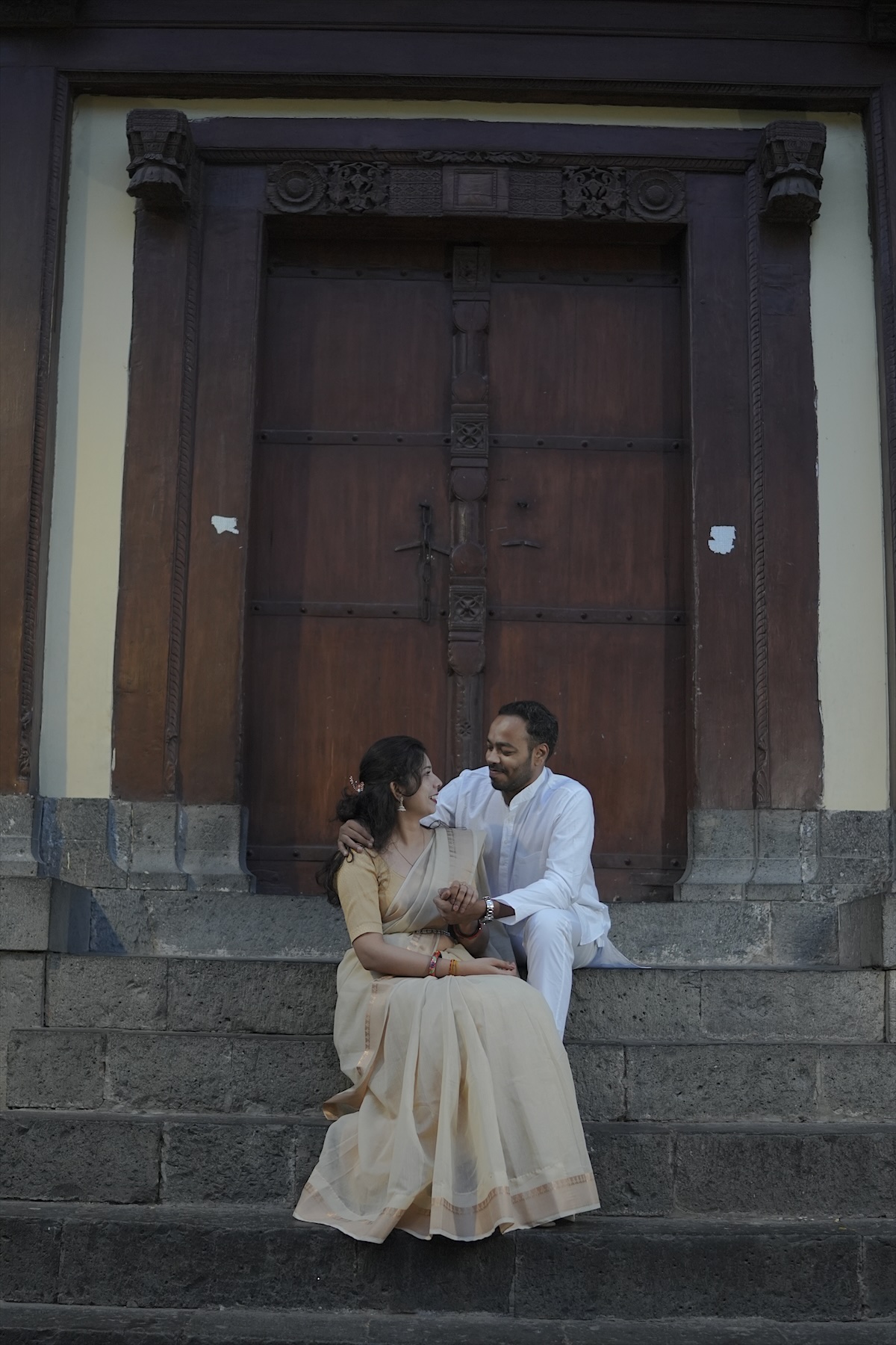 Together on the steps of an old haveli